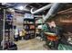 Unfinished basement space with storage shelves and miscellaneous equipment at 7335 Bethany Park, Martinsville, IN 46151