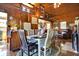 Inviting dining area featuring wood paneling, an open floor plan, and lots of natural lighting at 7335 Bethany Park, Martinsville, IN 46151