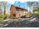 Two-story home featuring brick accents, a finished basement, and stairs leading to the upper level at 7335 Bethany Park, Martinsville, IN 46151