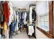 Features a well-organized walk-in closet with shelving and window at 7335 Bethany Park, Martinsville, IN 46151