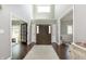 Grand entryway with hardwood floors, high ceilings and ample natural light at 7430 Franklin Parke Woods, Indianapolis, IN 46259