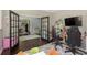 Comfortable playroom with gaming chair, TV, and view to dining room at 7430 Franklin Parke Woods, Indianapolis, IN 46259