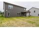 Backyard with minimal landscaping and two-story home at 7517 Big Bend Blvd, Camby, IN 46113