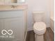 Bathroom featuring a vanity with light countertops, modern fixtures, and a toilet at 7517 Big Bend Blvd, Camby, IN 46113