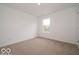 Simple bedroom with a view from the window and plush carpet at 7517 Big Bend Blvd, Camby, IN 46113