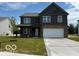 Charming two-story home featuring a modern design, stone accents, and a spacious two-car garage at 7517 Big Bend Blvd, Camby, IN 46113