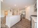 Bright kitchen with white cabinetry, stainless steel appliances, and a large island at 7517 Big Bend Blvd, Camby, IN 46113