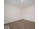 View of a room with wood-look flooring and bright white walls and trim at 7517 Big Bend Blvd, Camby, IN 46113