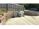 Private backyard with brick retaining wall and patio area, perfect for outdoor entertaining at 80 E College Ave, Martinsville, IN 46151