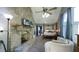 This bedroom features a brick fireplace, a sitting area, and shark decorations at 80 E College Ave, Martinsville, IN 46151