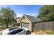 Spacious garage and driveway with ample parking space, plus nice landscaping at 80 E College Ave, Martinsville, IN 46151