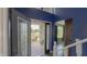 Bright Foyer with decorative glass door, hardwood floors, and staircase to second level at 80 E College Ave, Martinsville, IN 46151