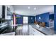 Bright, open living space featuring wood floors, modern amenities, and seamless flow to the kitchen at 80 E College Ave, Martinsville, IN 46151