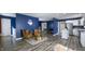 Open concept with living room, kitchen, and dining area, featuring hardwood flooring and natural lighting at 80 E College Ave, Martinsville, IN 46151