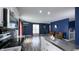 Bright, open living space featuring wood floors, modern amenities, and seamless flow to the kitchen at 80 E College Ave, Martinsville, IN 46151