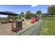 Well-equipped community playground with multiple play areas for children to enjoy at 80 E College Ave, Martinsville, IN 46151
