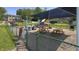 A fenced community playground with covered picnic tables and fun place to play at 80 E College Ave, Martinsville, IN 46151