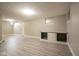 Finished basement area with vinyl flooring and built-in storage at 858 Cedar Wood, Carmel, IN 46032