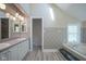 Bright primary bath with double sink vanity, soaking tub, stand alone shower, and gray accents at 858 Cedar Wood, Carmel, IN 46032
