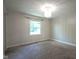 Bedroom with carpet, one window, and decorative chandelier lighting fixture at 858 Cedar Wood, Carmel, IN 46032