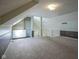 Large bonus room with a built in wardrobe closet and neutral carpeting at 858 Cedar Wood, Carmel, IN 46032