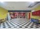 A large garage with a checkered floor and plenty of storage space at 858 Cedar Wood, Carmel, IN 46032