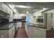 Full kitchen view showing granite countertops, stainless appliances, island, and modern cabinetry at 858 Cedar Wood, Carmel, IN 46032