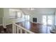 Second story view of the living room featuring a fireplace and hardwood floors at 858 Cedar Wood, Carmel, IN 46032