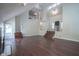 Bright living room features high ceilings, a staircase, and hardwood flooring at 858 Cedar Wood, Carmel, IN 46032
