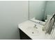 Powder room featuring white countertop and modern fixtures at 9154 Sea Oats Dr, Indianapolis, IN 46250
