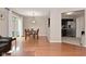 Dining room with wooden table and chairs with an adjacent kitchen at 9154 Sea Oats Dr, Indianapolis, IN 46250
