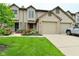 Charming townhome with well-manicured lawn and attached two-car garage at 9154 Sea Oats Dr, Indianapolis, IN 46250