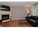 Living room with fireplace, hardwood floors, and plenty of space for entertaining at 9154 Sea Oats Dr, Indianapolis, IN 46250