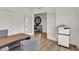 Bright office space featuring a wood desk, gray chairs, and French doors at 9363 Abner St, McCordsville, IN 46055