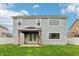 Expansive backyard featuring a well-maintained lawn, modern siding, and charming covered patio at 951 Parker Ln, Westfield, IN 46074