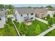 Aerial view of a spacious backyard featuring a pergola, lush green lawn, and privacy fence at 951 Parker Ln, Westfield, IN 46074