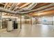Unfinished basement with exposed ceiling, concrete walls, and utility equipment ready for customization at 951 Parker Ln, Westfield, IN 46074