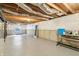 Unfinished basement space with concrete floors, exposed ducts, and a window for natural light at 951 Parker Ln, Westfield, IN 46074