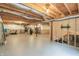 Unfinished basement with exposed wood supports, a cement floor and water tank at 951 Parker Ln, Westfield, IN 46074