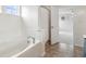 This bathroom has a large tub, tiled floors, and a shower at 951 Parker Ln, Westfield, IN 46074