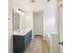 The bathroom features a double sink, tiled floors, and a large bathtub at 951 Parker Ln, Westfield, IN 46074