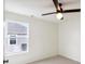Bedroom featuring a ceiling fan, window, and neutral carpet at 951 Parker Ln, Westfield, IN 46074