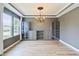 Empty room featuring hardwood floors, ample natural light, and neutral paint colors at 951 Parker Ln, Westfield, IN 46074