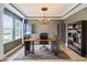 Home office with a large desk, built-in bookshelves, and natural light at 951 Parker Ln, Westfield, IN 46074