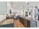 Spacious kitchen with granite countertops, stainless appliances, and a large island at 951 Parker Ln, Westfield, IN 46074