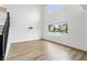 Bright and airy living room featuring high ceilings, a large window, and hardwood floors at 951 Parker Ln, Westfield, IN 46074