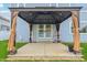 Covered patio featuring an elegant pergola, concrete flooring, and seamless access to the home's interior at 951 Parker Ln, Westfield, IN 46074