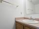 Clean bathroom featuring a vanity with a sink and a large mirror at 9572 Maple Way, Indianapolis, IN 46268