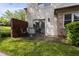 Relaxing outdoor patio with comfortable seating and a view of the lush backyard at 9572 Maple Way, Indianapolis, IN 46268