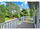 Inviting outdoor space showcasing a well-maintained backyard and upper deck at 10036 E Troy Ave, Indianapolis, IN 46239